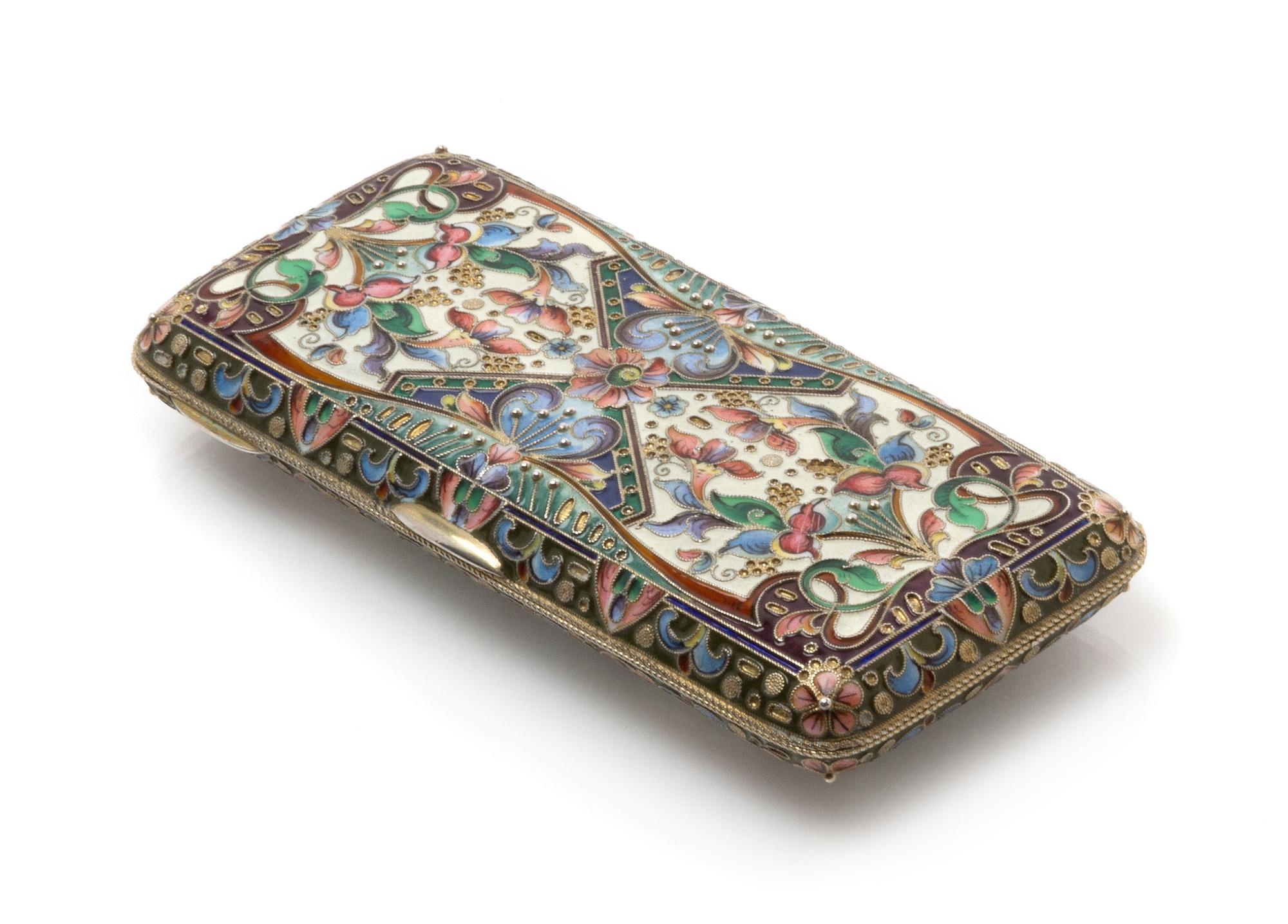 A Russian Enameled Silver Cigarette Case, Mark of M. Chirkov, Moscow, the case with polychrome floral and foliate enamels throughout, w