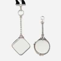 A pair of Edwardian platinum and diamond lorgnettes