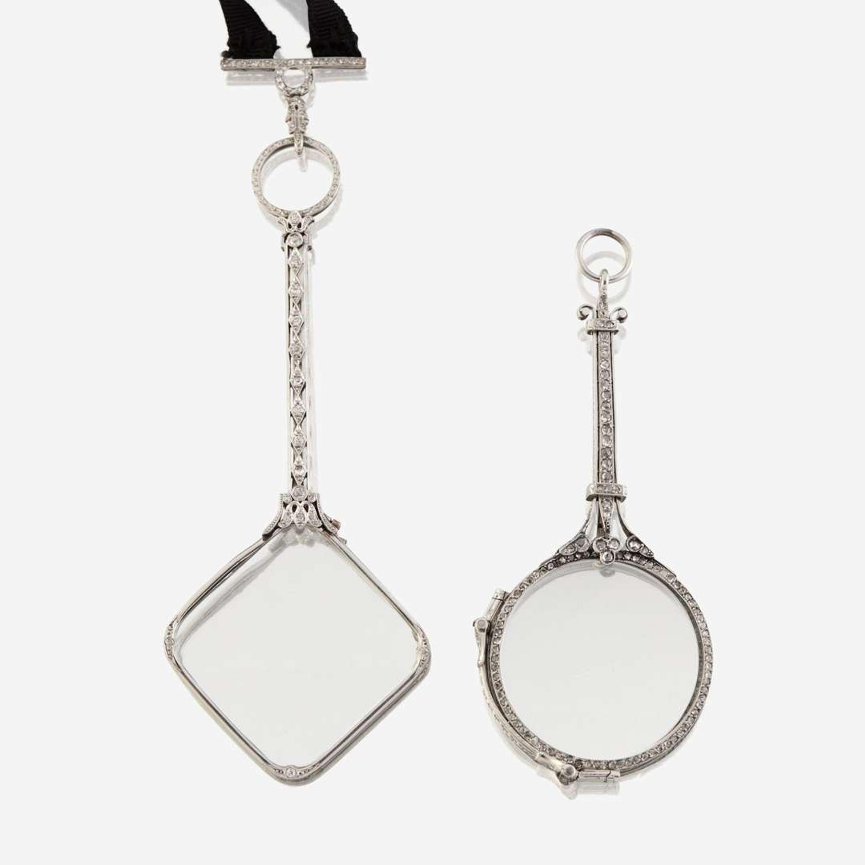A pair of Edwardian platinum and diamond lorgnettes