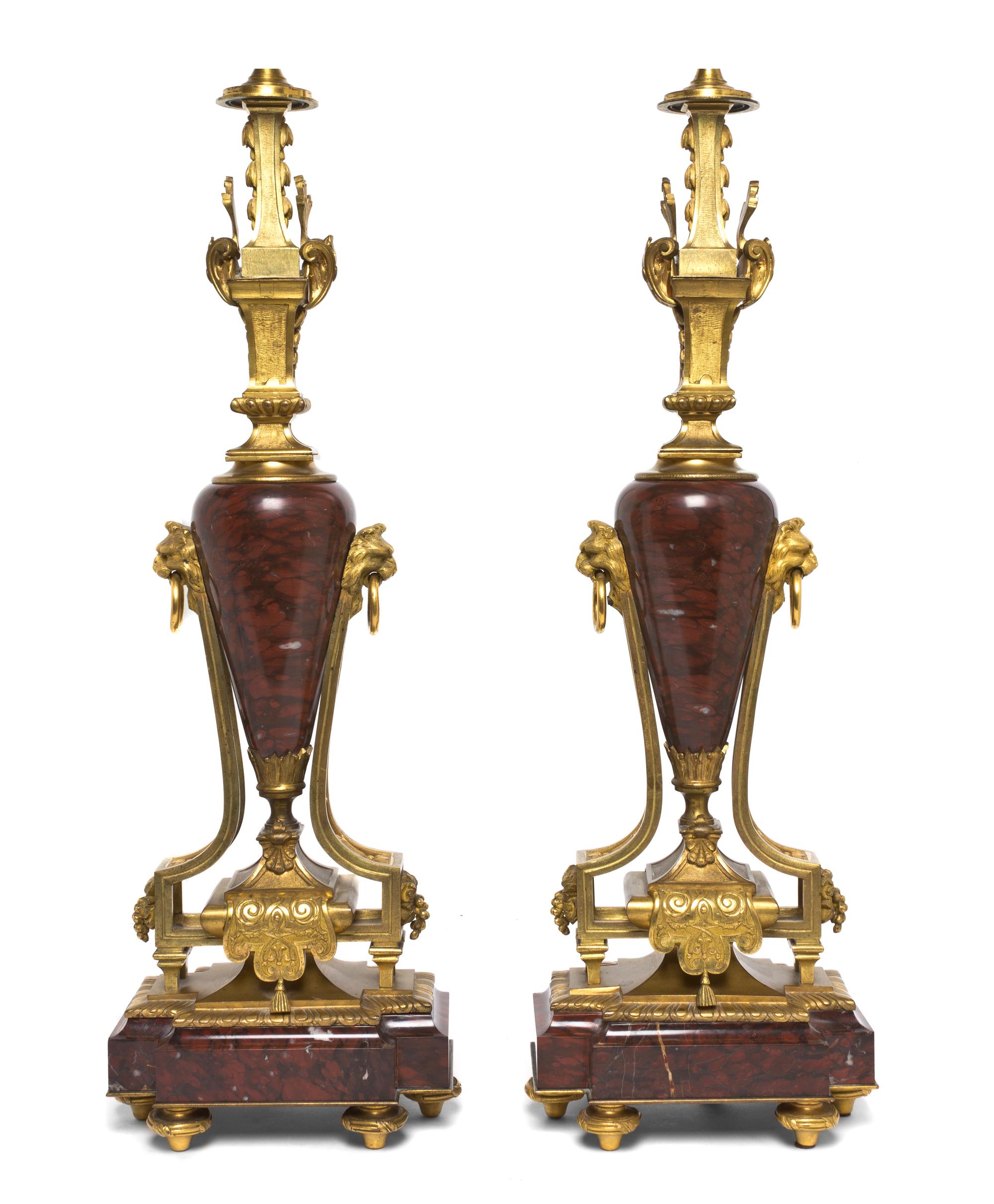 A Pair of French Rouge Marble and Gilt Bronze Lamps, Height overall 38 5/8 inches.