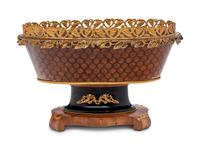 A Napoleon III Gilt Metal Mounted, Parcel Ebonized and Parquetry Jardinière