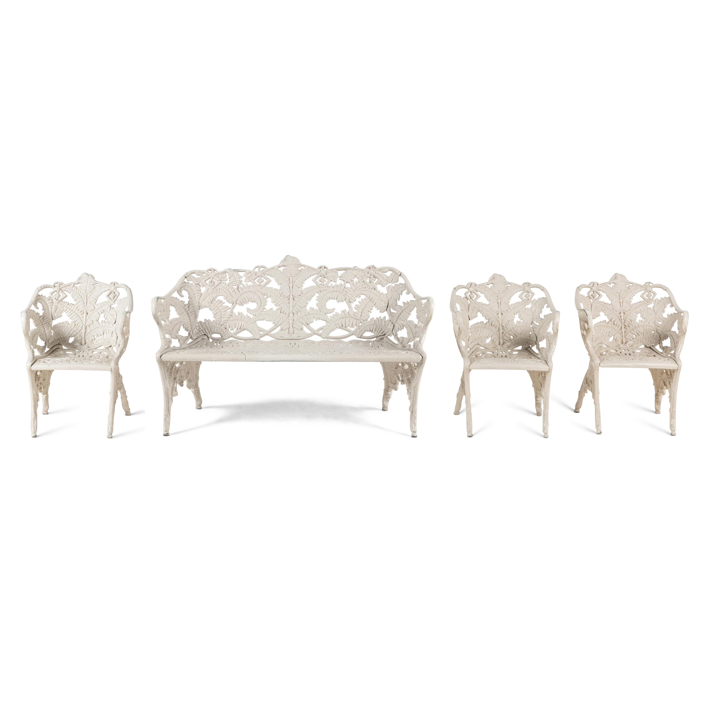 A Four-Piece Cast Iron Garden Seating Suite