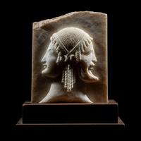 A Neoclassical Marble Relief Fragment with Janus