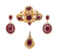 A Collection of Yellow Gold and Garnet Jewelry, 23.00 dwts.