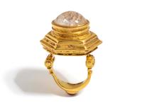 A Hellenistic Gold Finger Ring — with cabochon rock crystal and garnet