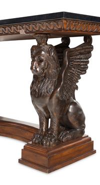 A Carved Wood Console Table with Lion Supports