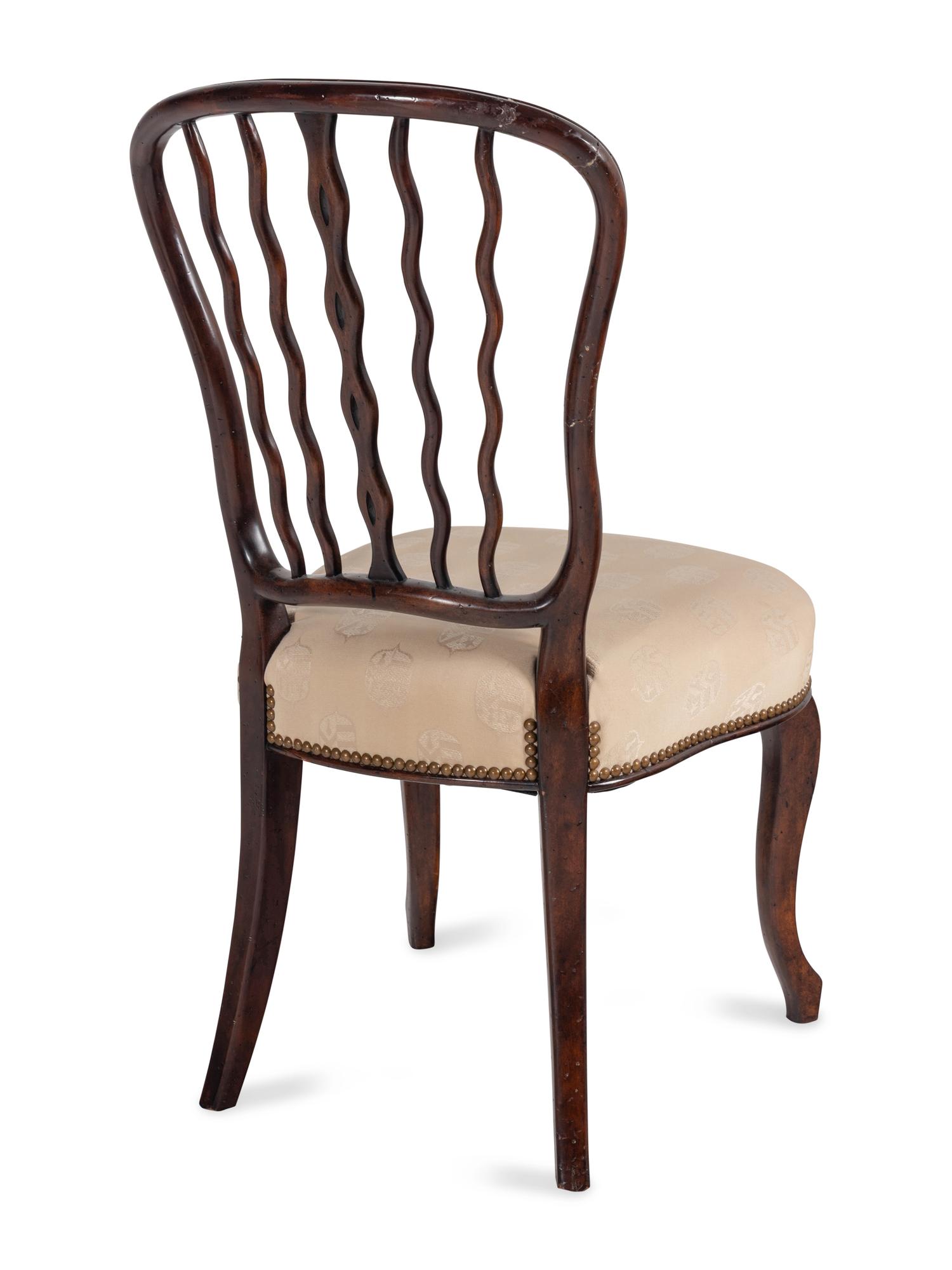 A Set of Eight Theodore Alexander Althorp Mahogany Dining Chairs