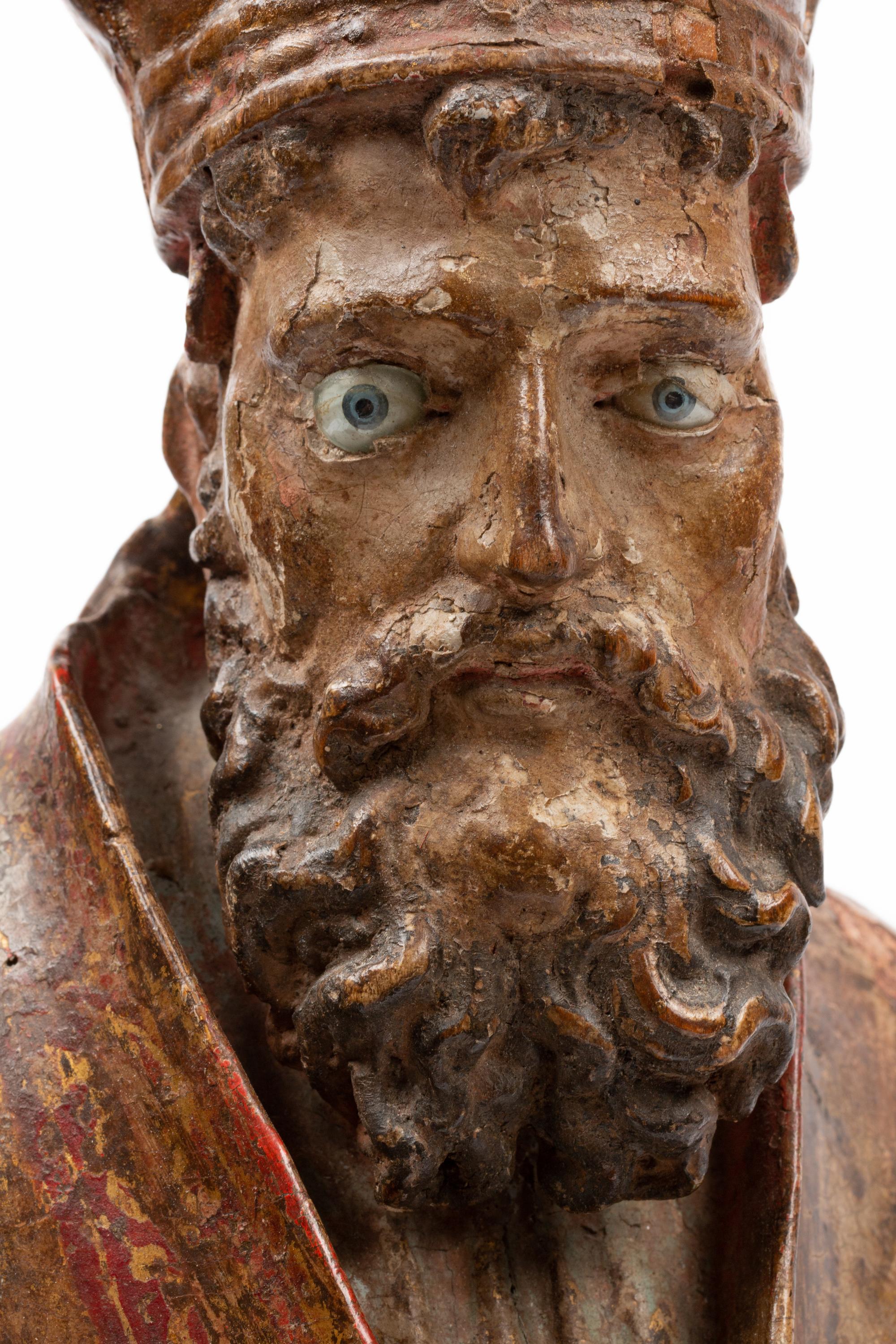 A Continental Painted and Parcel Gilt Bust of a Saint