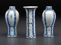 A Chinese Export Parcel Gilt Blue and White Porcelain Garniture