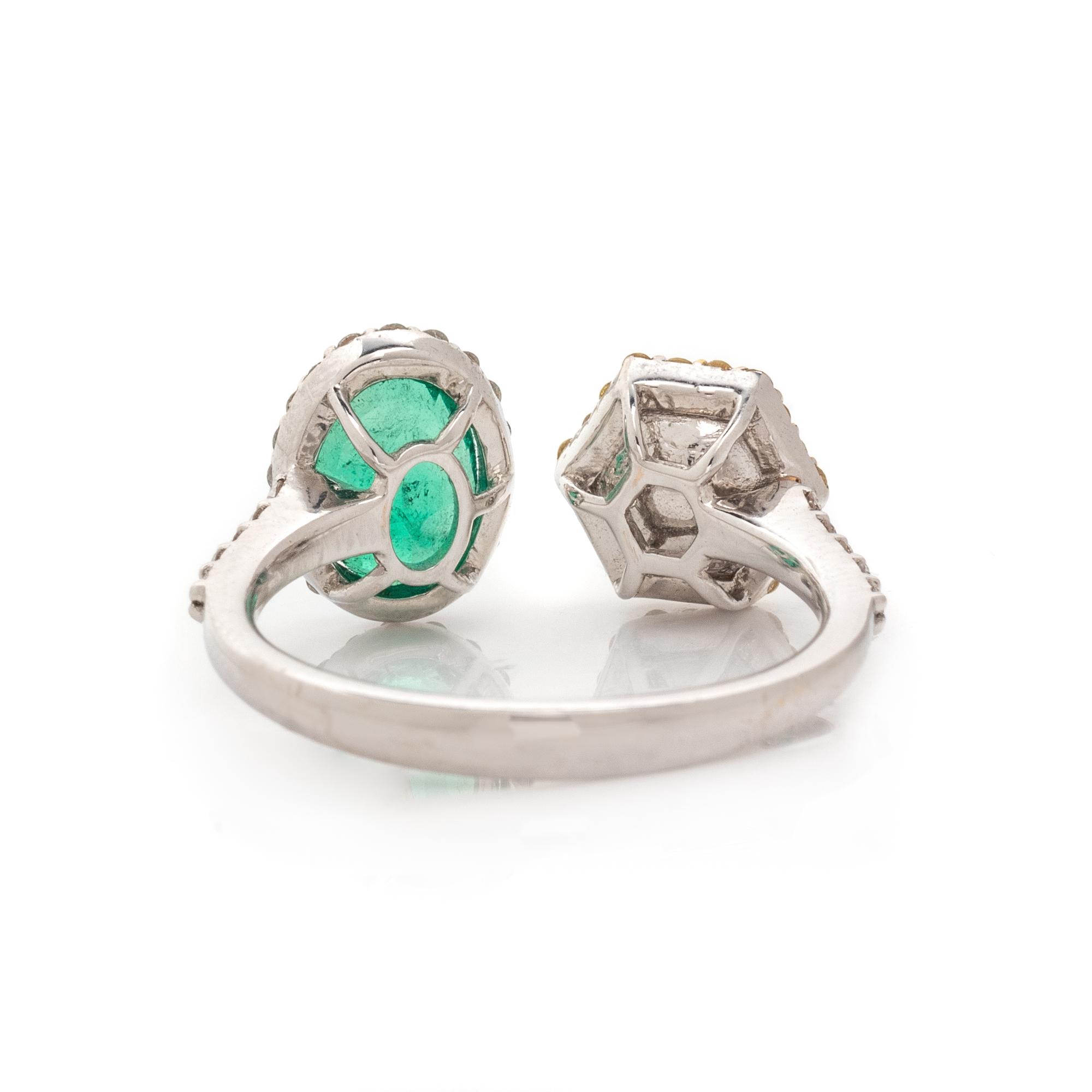 COLORED DIAMOND, DIAMOND, AND EMERALD TOI ET MOI RING