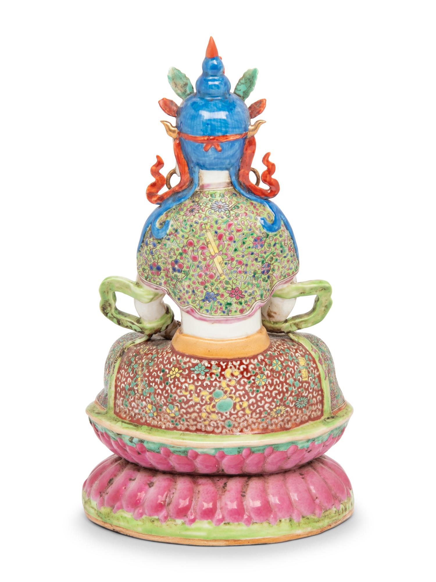 A Chinese Famille Rose Figure of a Seated Bodhisattva