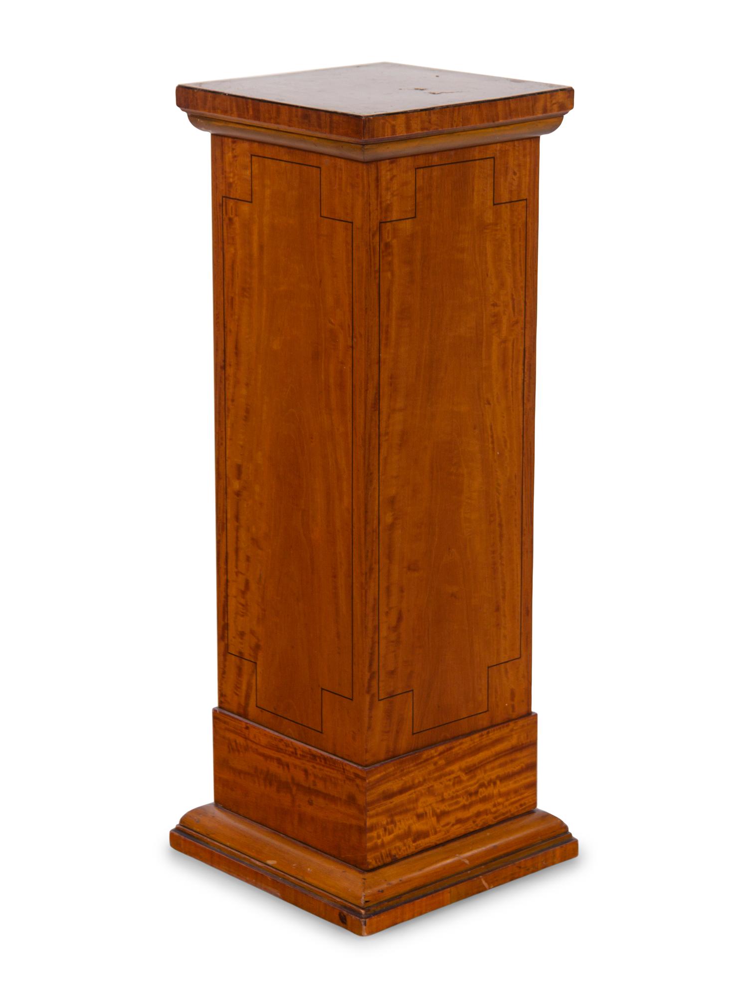 An Edwardian Satinwood Pedestal