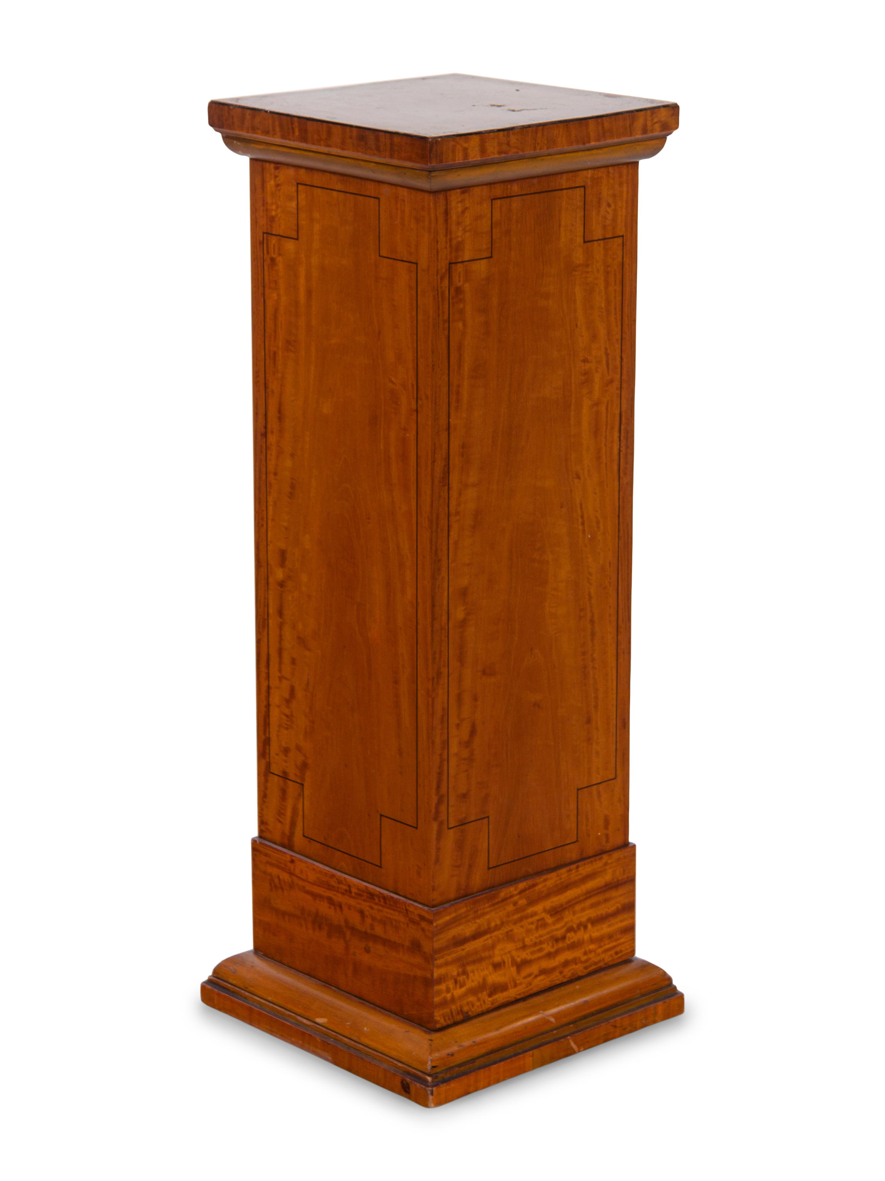 An Edwardian Satinwood Pedestal