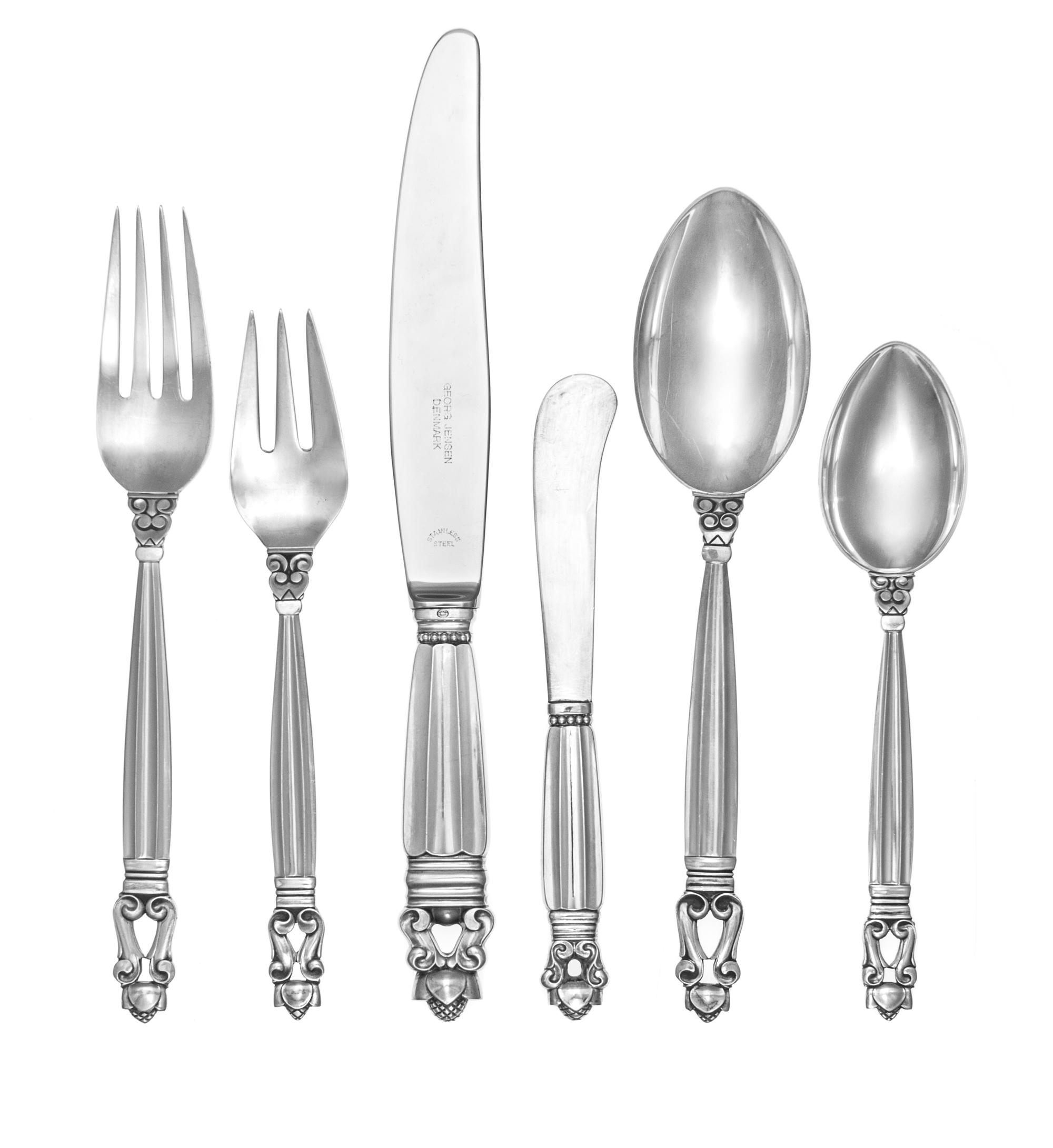 A Danish Silver Flatware Service, Georg Jensen Silversmithy, Copenhagen, Acorn pattern, comprising: 12 dinner knives 12 dinner forks 12