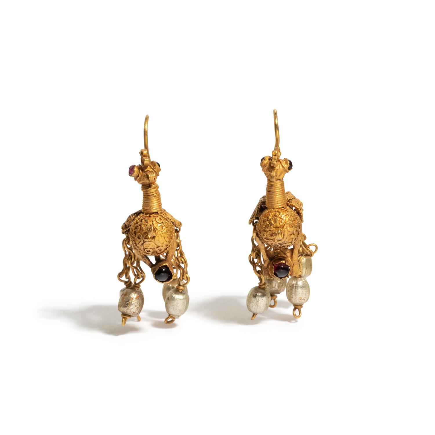 A Pair of Byzantine or Islamic Gold and Amethyst Earrings in the Form of Doves