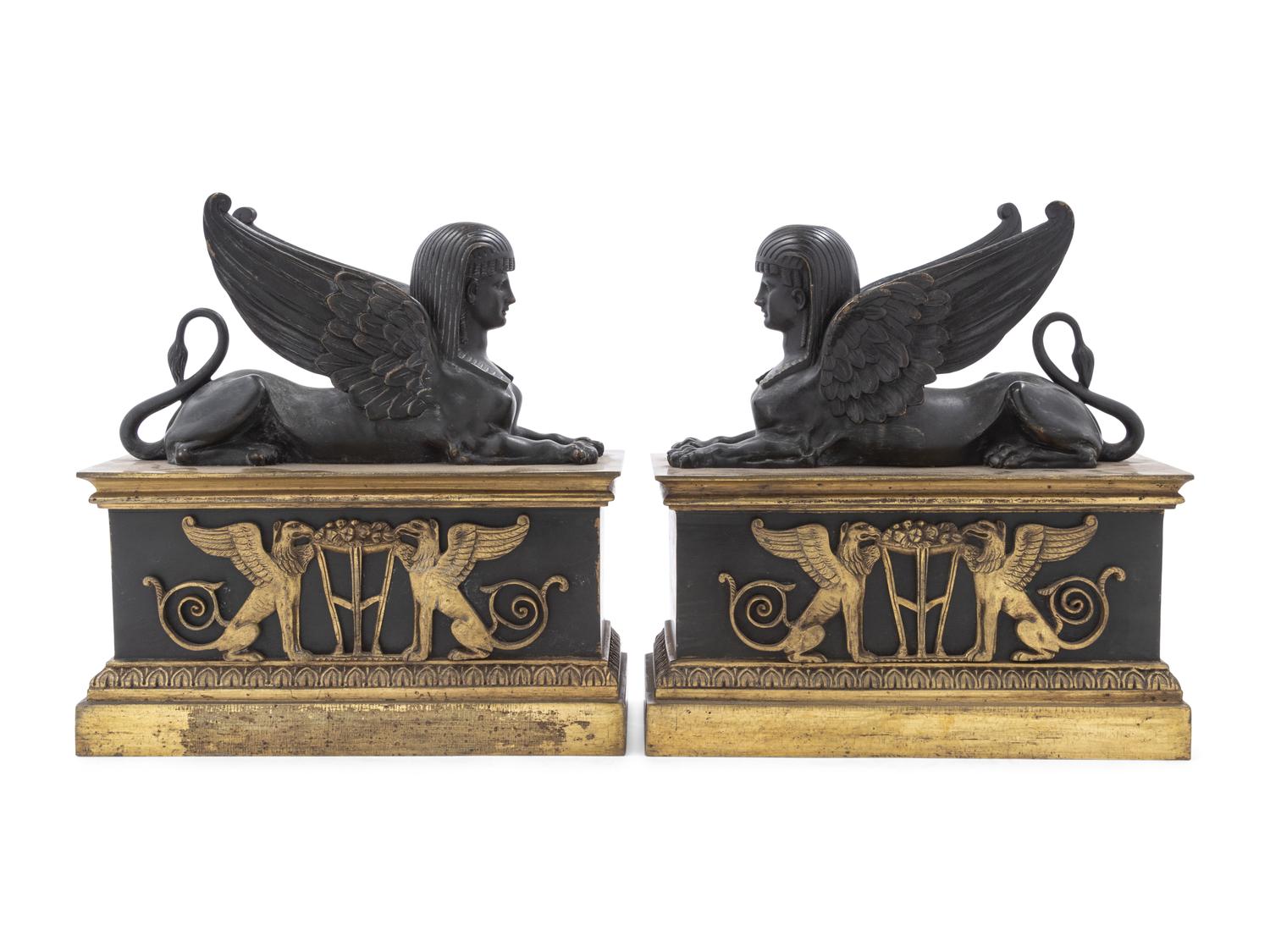 A Pair of Empire Gilt and Patinated Bronze Sphinx Ornaments
