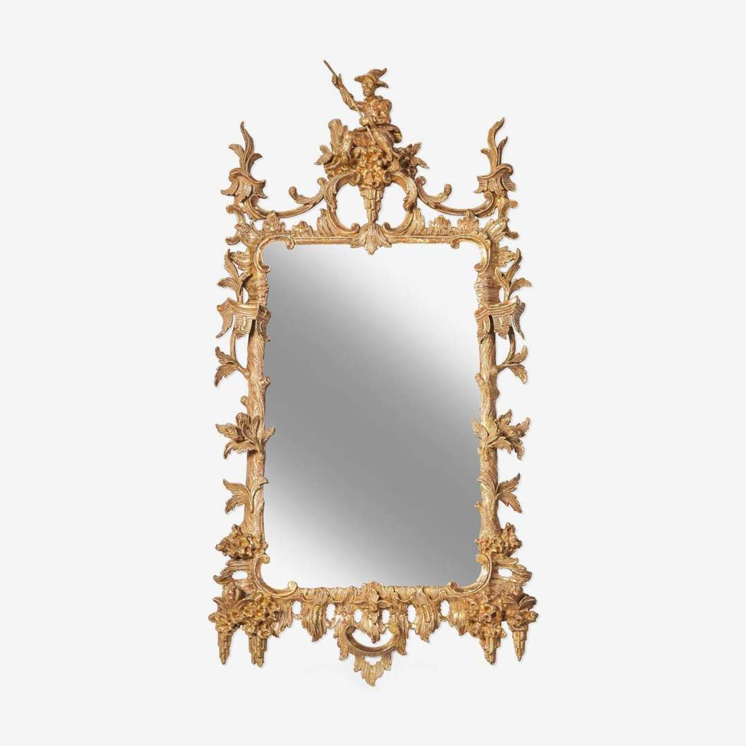 A George III Chippendale carved giltwood looking glass in the Chinese taste circa 1765