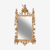 A George III Chippendale carved giltwood looking glass in the Chinese taste circa 1765