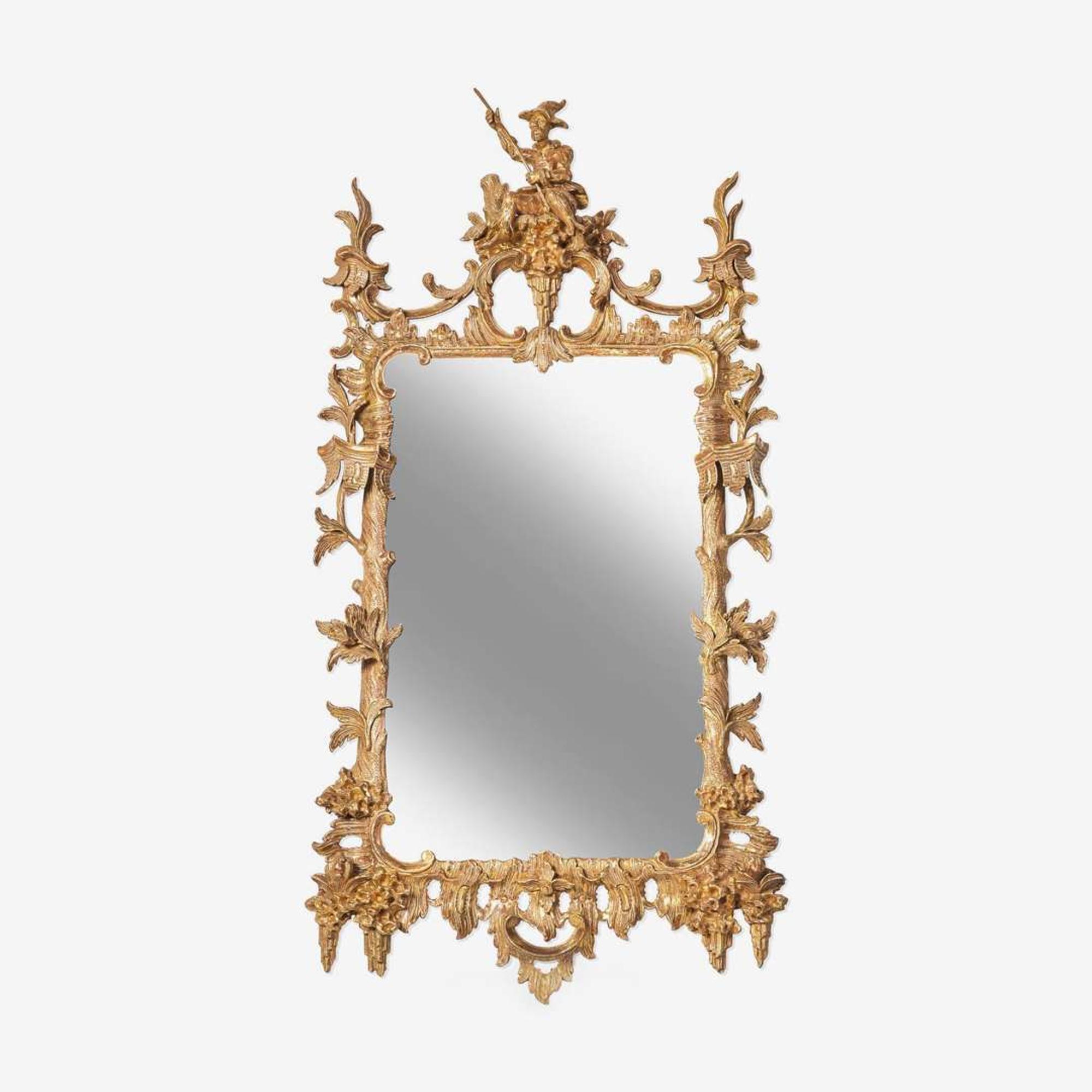 A George III Chippendale carved giltwood looking glass in the Chinese taste circa 1765