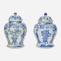 Two similar Chinese blue and white porcelain baluster jars and covers Kangxi period