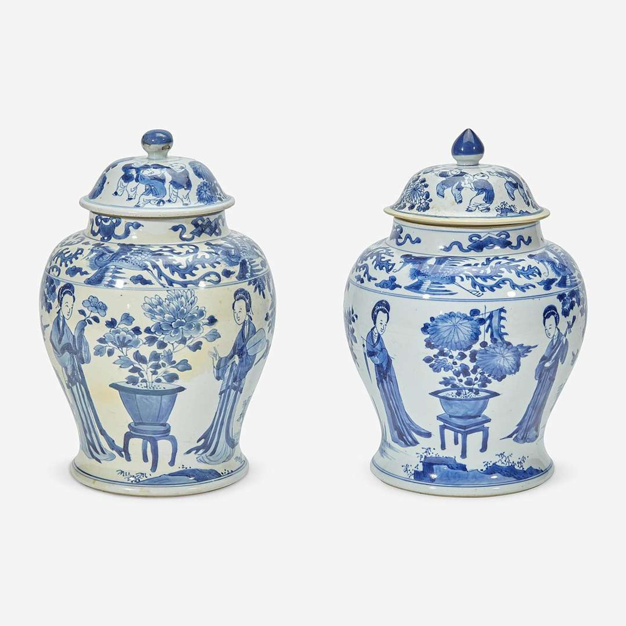 Two similar Chinese blue and white porcelain baluster jars and covers Kangxi period