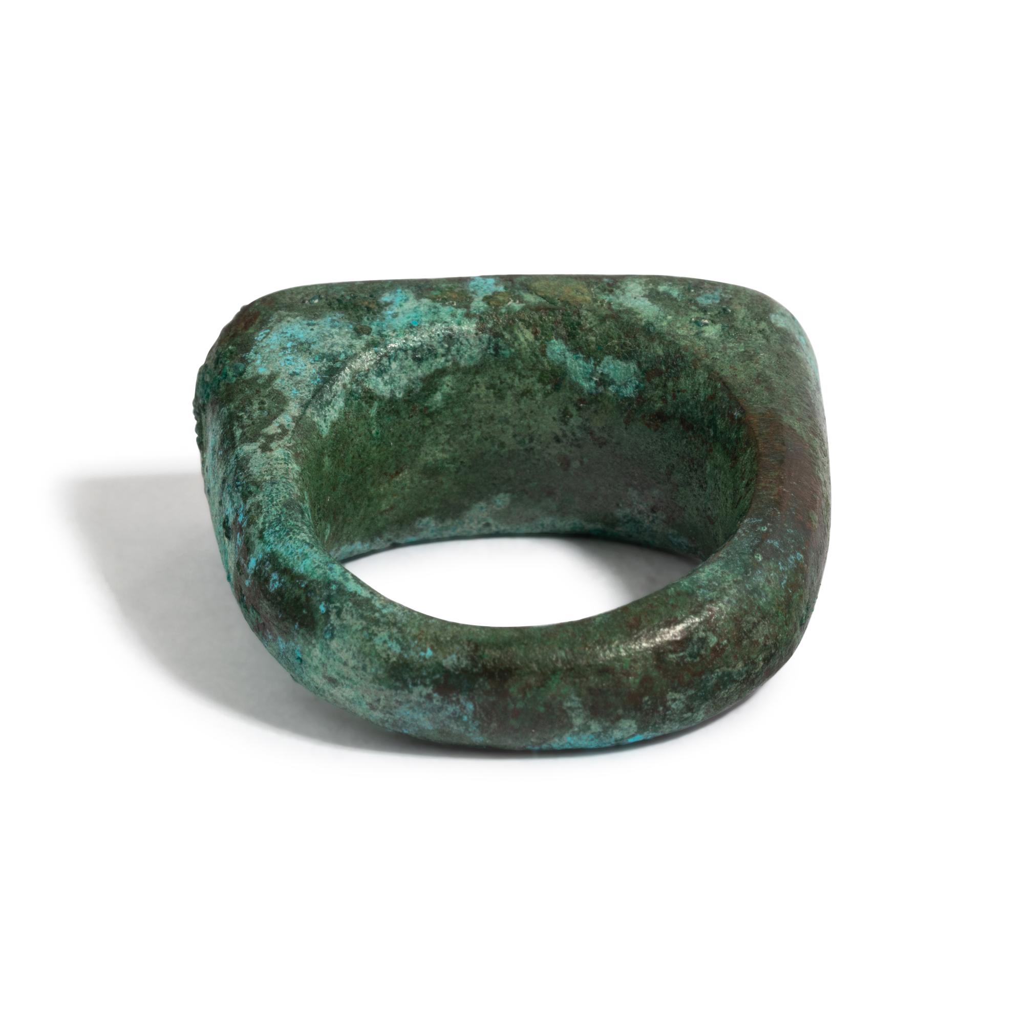 An Egyptian Bronze Stirrup Ring