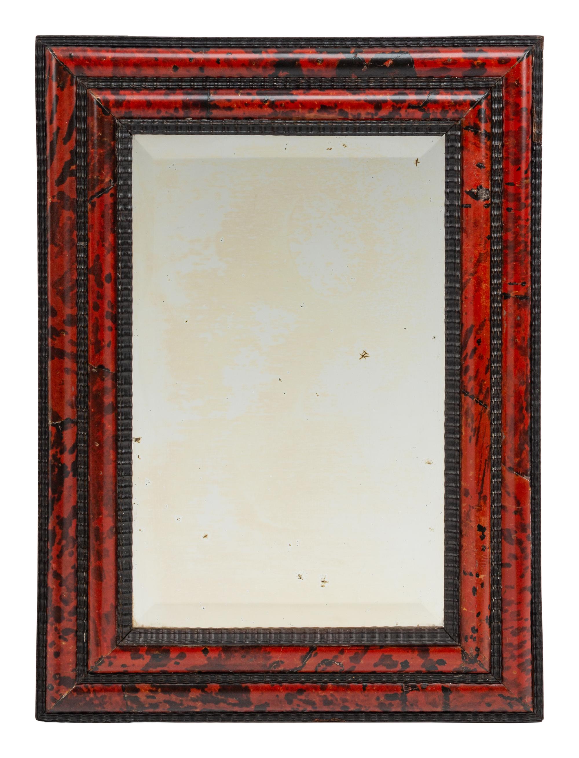 A Flemish Baroque Style Faux Tortoise and Ebonized Wood Mirror