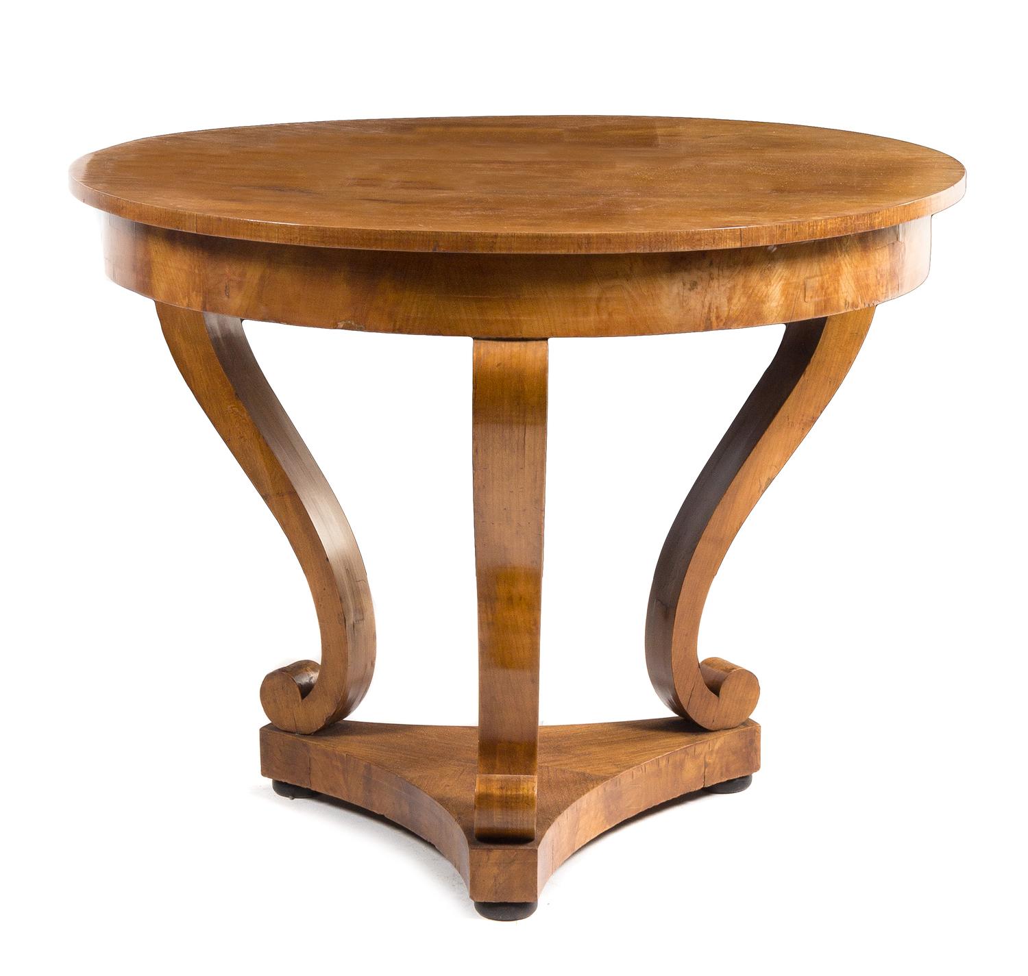 A Biedermeier Fruitwood Center Table Height 30 x diameter 39 inches. — MID-19TH CENTURY