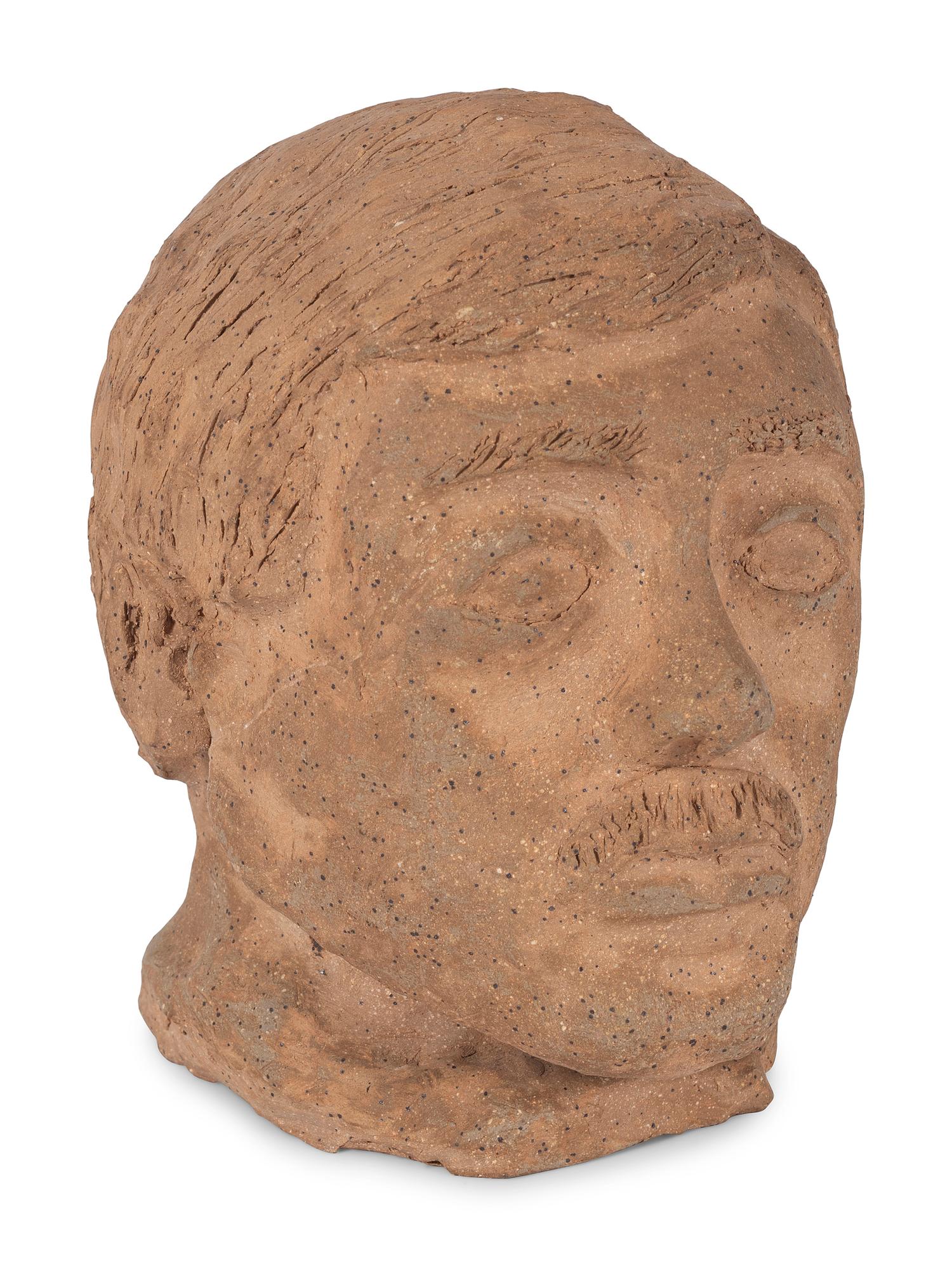 Three Folk Art Sculpted Heads