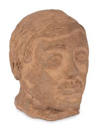 Three Folk Art Sculpted Heads