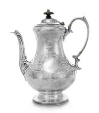 A Victorian Silver Coffee Pot, Daniel & Charles Houle, London, 1854, the baluster form body chased with floral and foliate motifs and h