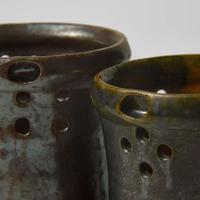George Ohr (American, 1857-1918) Two Puzzle Mugs in Mirror Brown and Olive Glaze, Biloxi, Mississippi, USA, circa 1898-1910