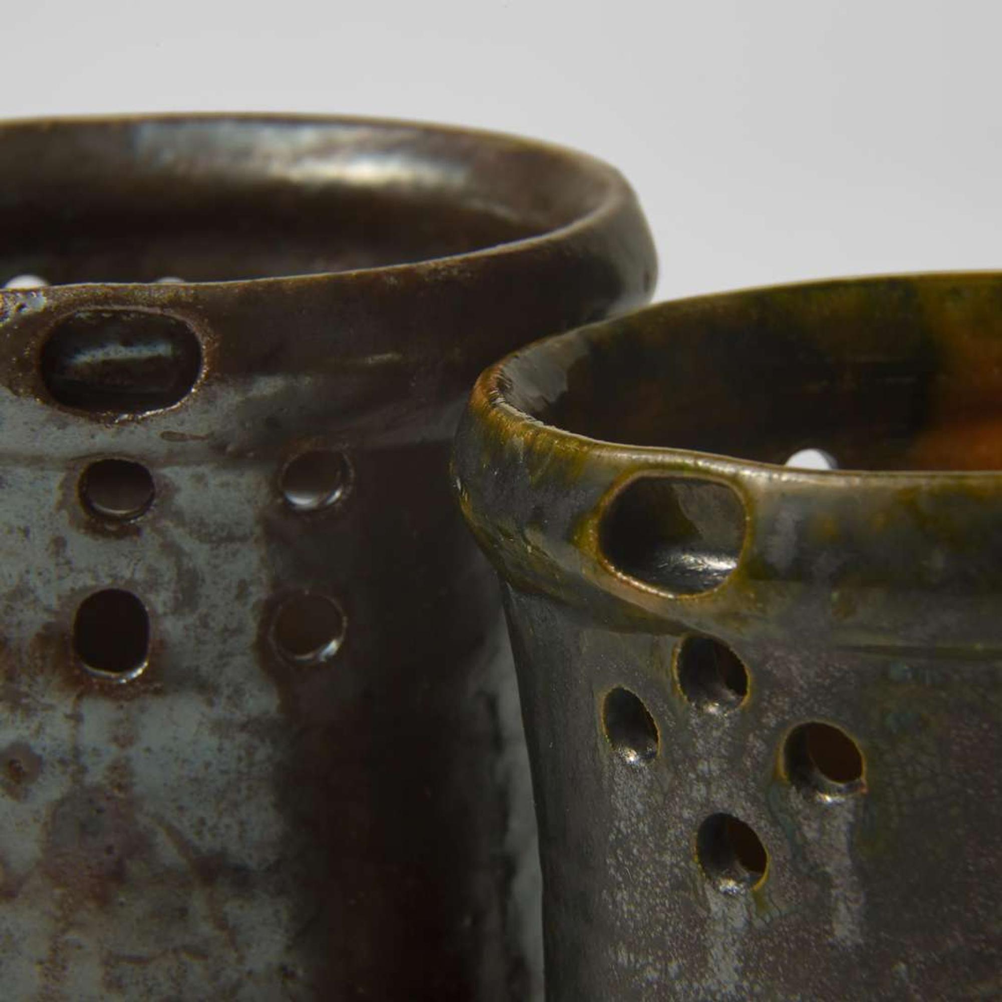 George Ohr (American, 1857-1918) Two Puzzle Mugs in Mirror Brown and Olive Glaze, Biloxi, Mississippi, USA, circa 1898-1910