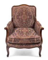 A Louis XV Style Upholstered Bergère Height 34 inches. — 20TH CENTURY