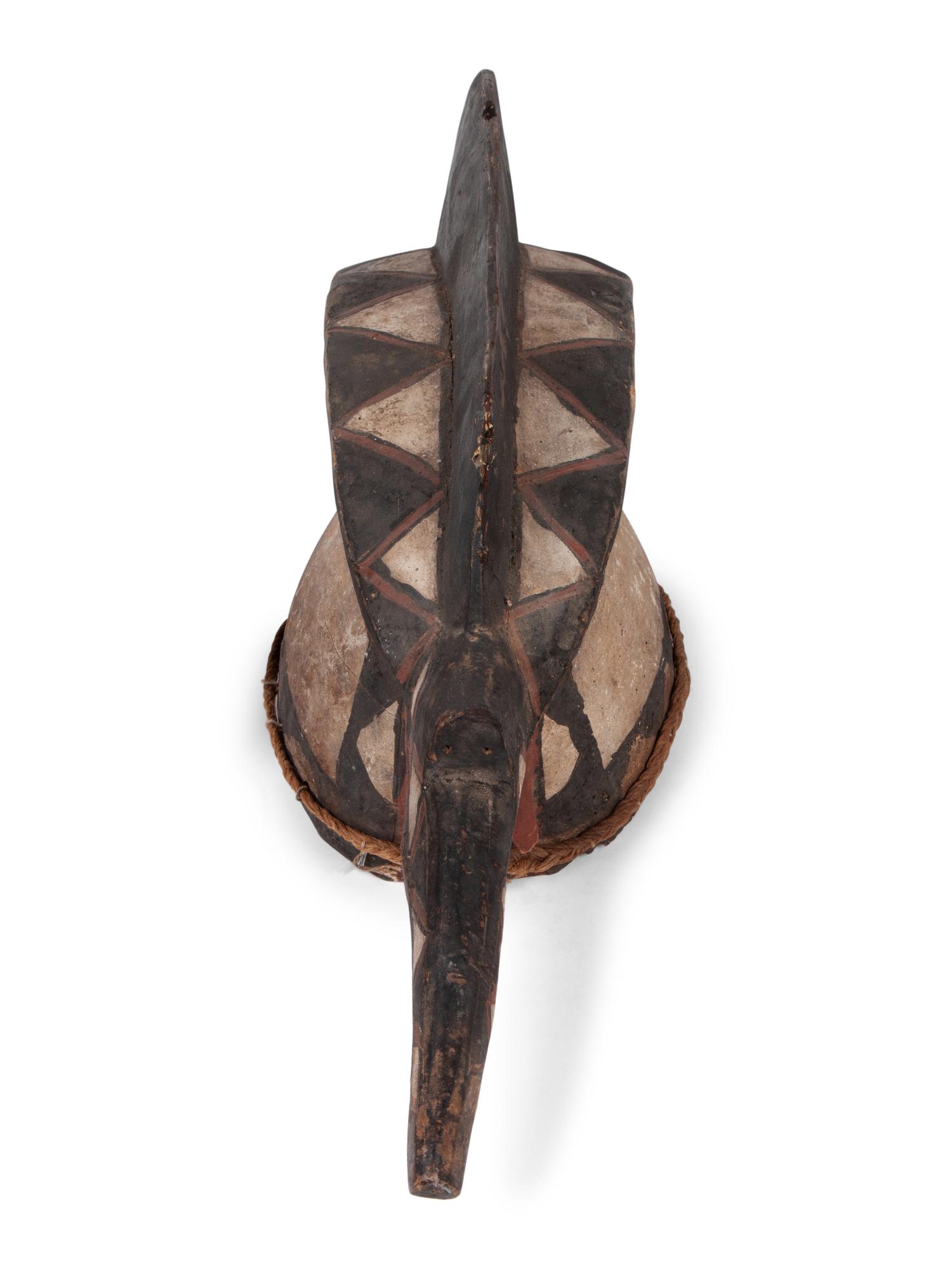 A Group of Ten Carved Ethnographic Masks