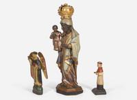 A group of three carved and painted Santos figures, 19th / 20th century