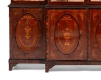 An English Mahogany and Marquetry Breakfront Bookcase