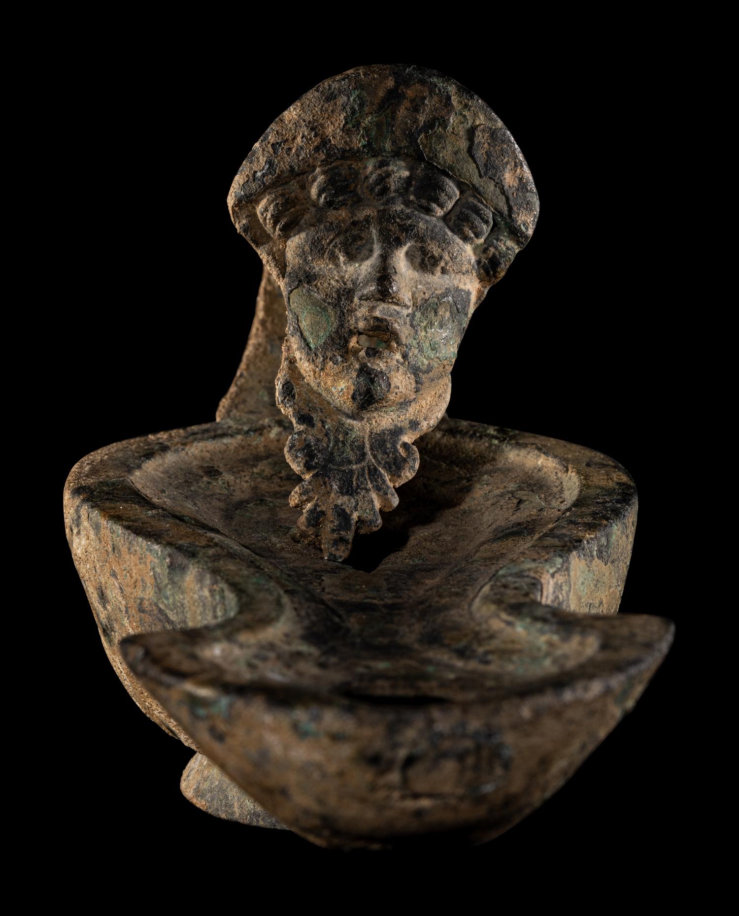 A Roman Bronze Oil Lamp