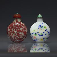 Two Chinese Splashed Glass Snuff Bottles, Qing Dynasty, Circa 1750-1820 — 1750-1820年 攪料鼻煙壺兩支