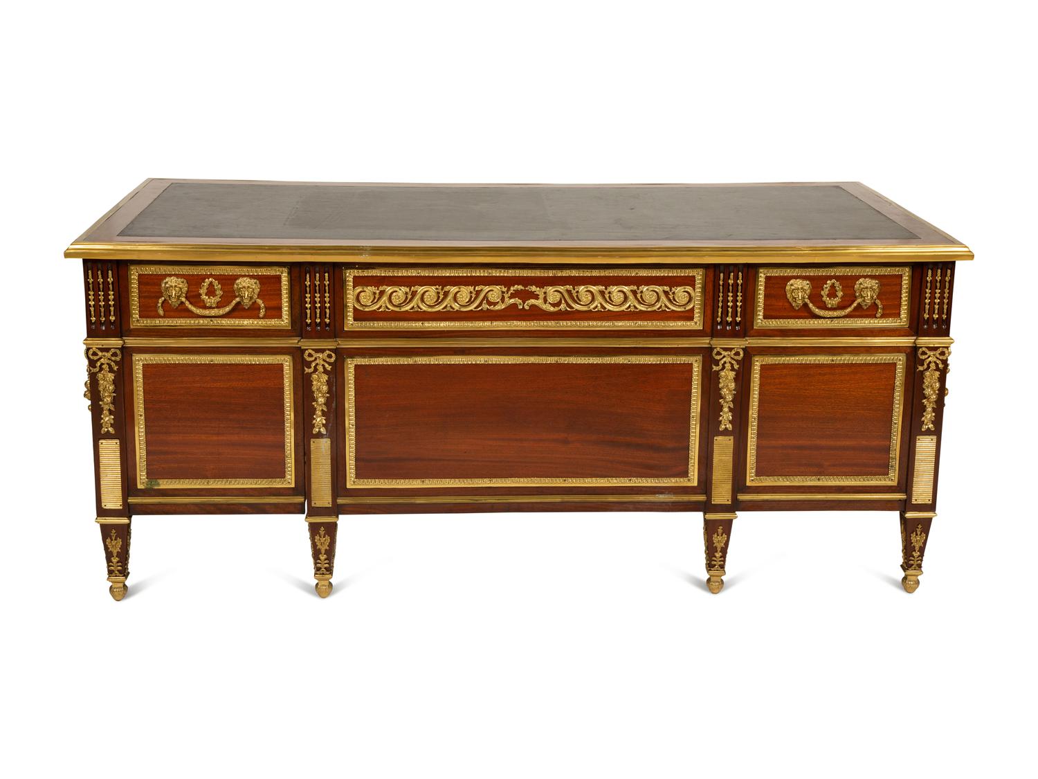 A Louis XVI Style Gilt Bronze Mounted Mahogany Bureau Plat