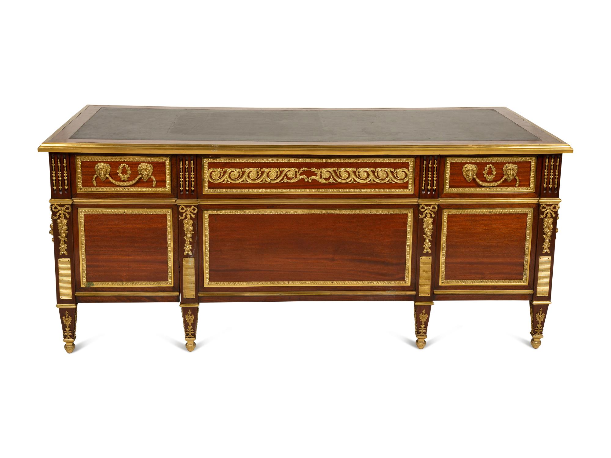 A Louis XVI Style Gilt Bronze Mounted Mahogany Bureau Plat