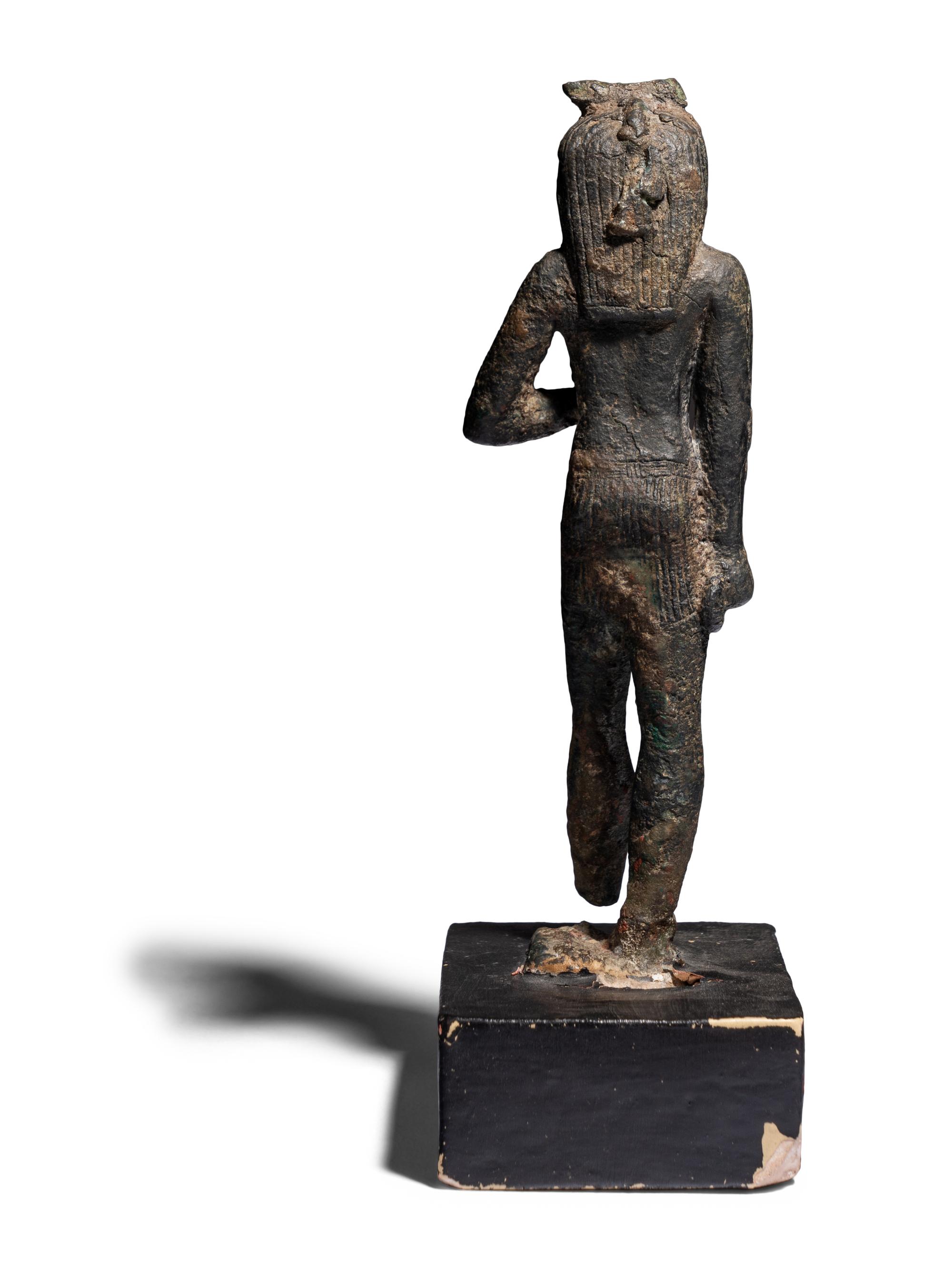 An Egyptian Bronze Figure