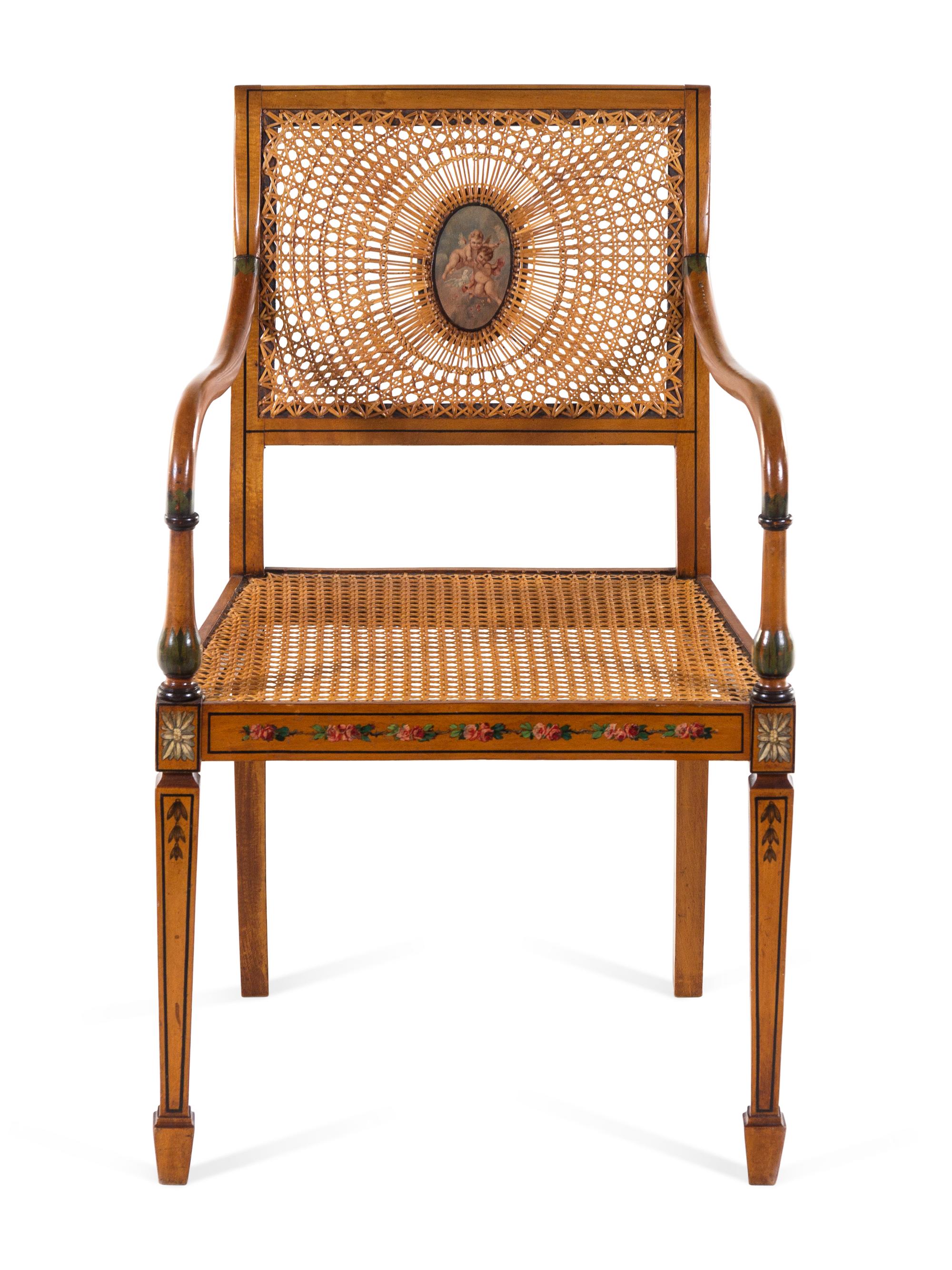 An Edwardian Painted Beechwood Cane Upholstered Armchair