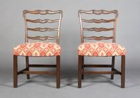 A Pair of Mahogany Ladder Back Side Chairs, Height 37 1/4 inches.