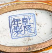 A Canton Enamel and Gilt Metal Snuff Bottle Height 3 inches.
