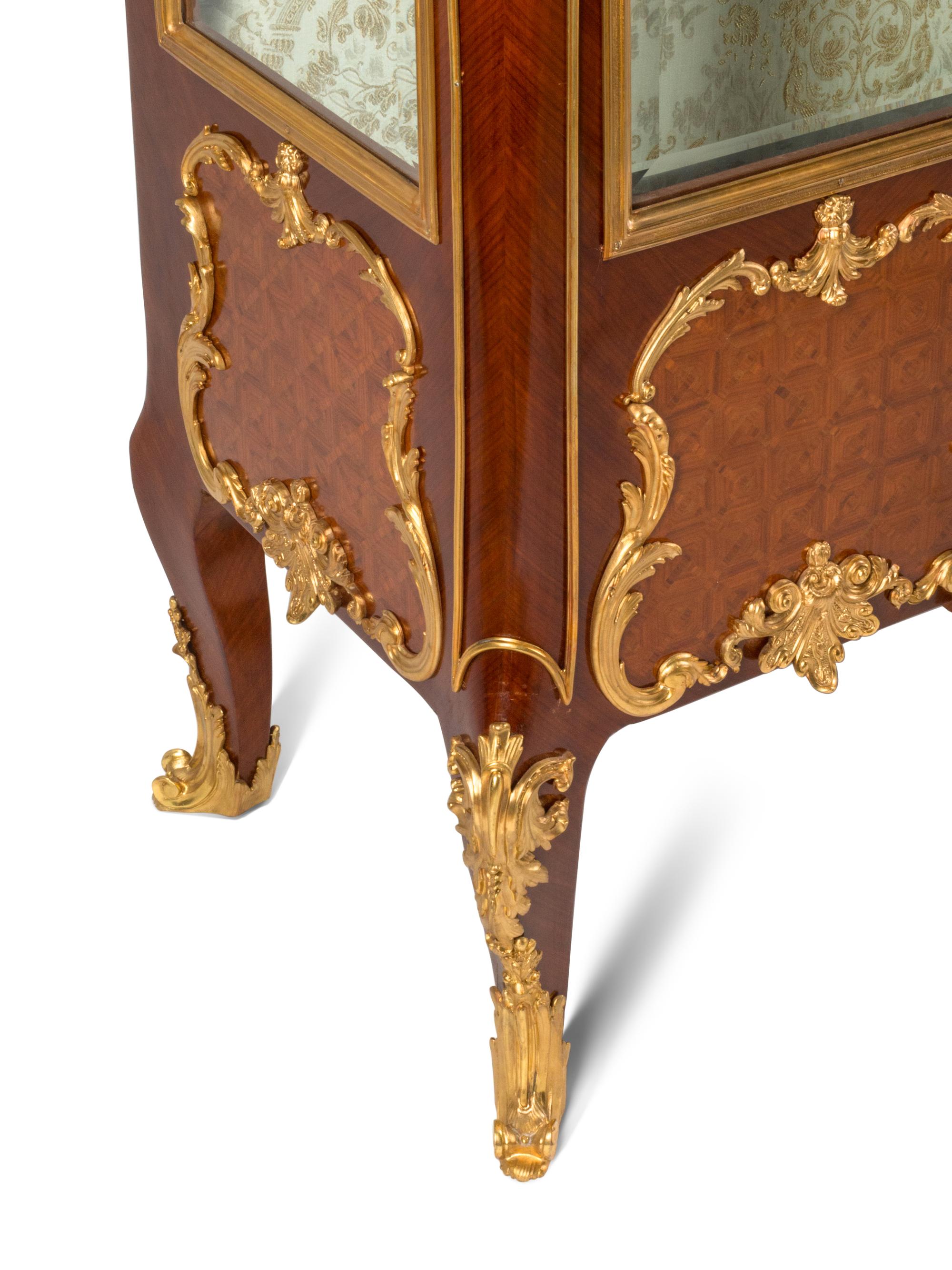 A Louis XV Style Gilt Bronze Mounted Marquetry Marble-Top Vitrine Cabinet
