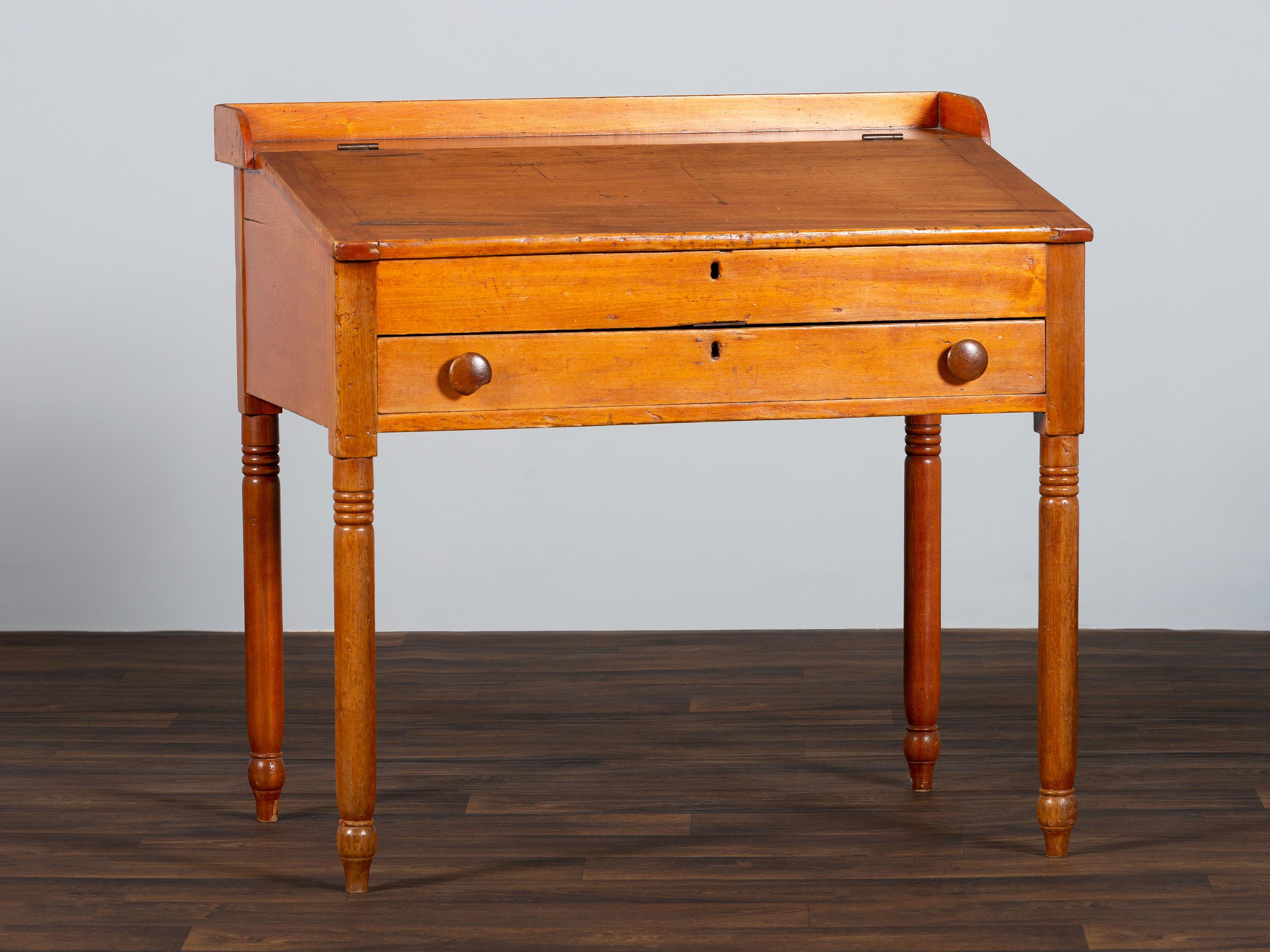 A Late Federal Red-Stained Pine One-Drawer Slant-Lid Schoolmaster's Desk