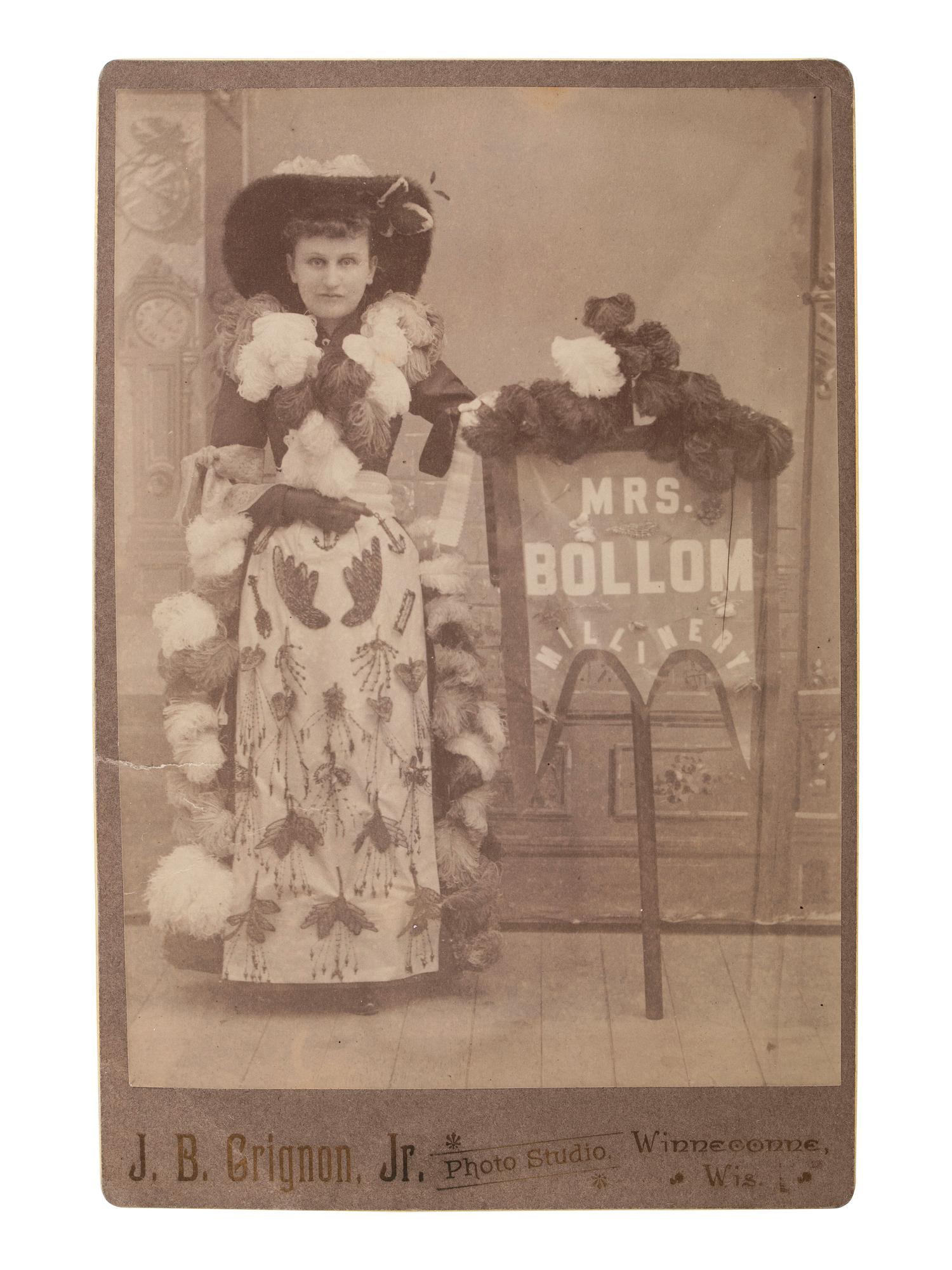 [EARLY PHOTOGRAPHY - OCCUPATIONAL]. GRIGNON, J.B., photographer. Cabinet card of "Advertising Lady" promoting Mrs. Bollom Millinery. Winneconne, WI.
