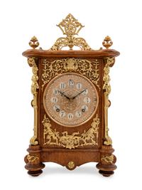 An Ansonia Cabinet B Gilt Metal Mounted Oak Shelf Clock