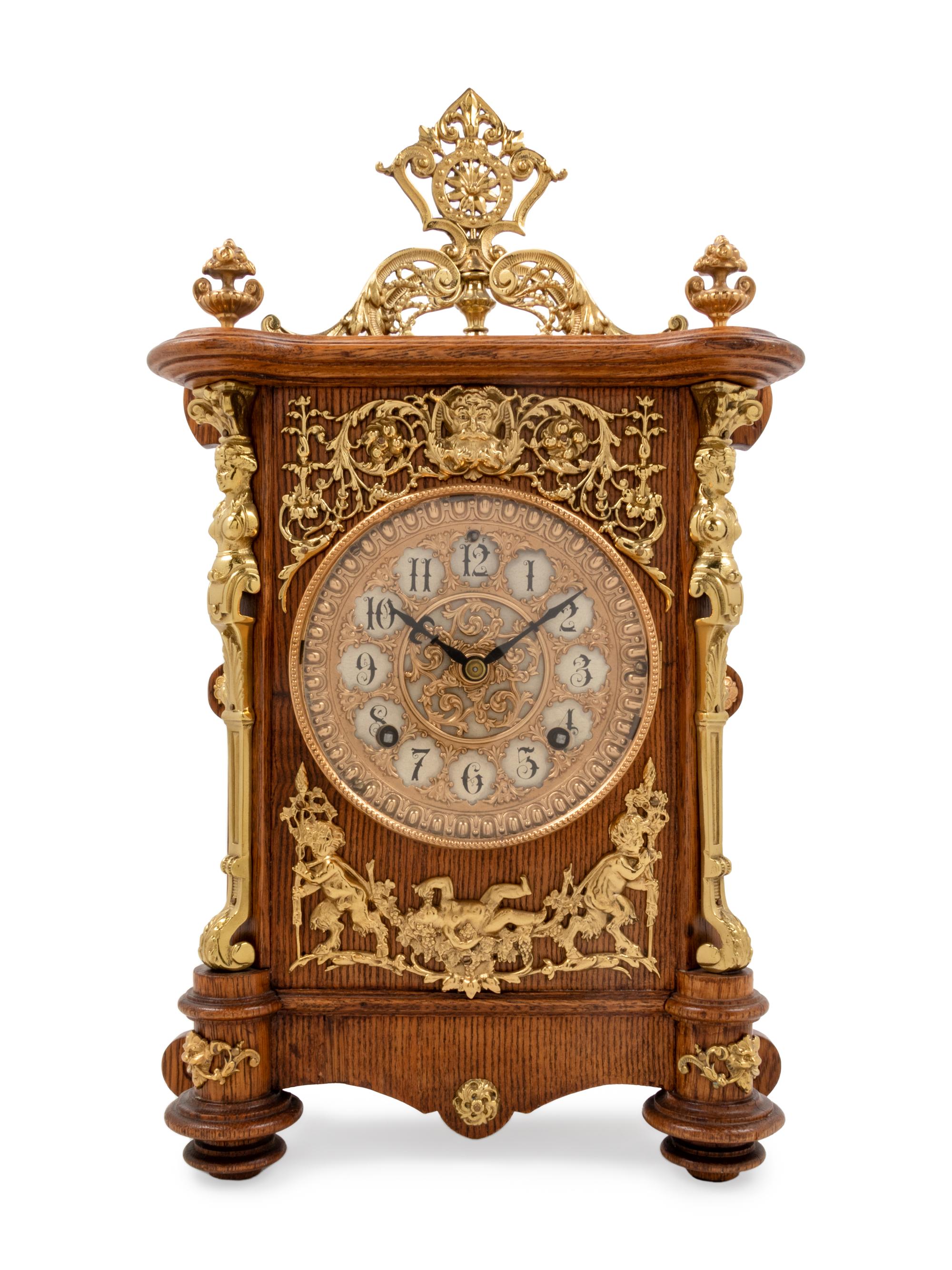 An Ansonia Cabinet B Gilt Metal Mounted Oak Shelf Clock